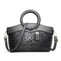 Fabric ladies' casual handbag showing multiple compartments including phone and ID pockets