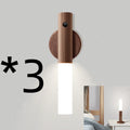Compact smart sensor LED desk lamp with solid wood base and organic glass panel in coffee colour.