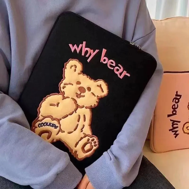 Embroidered laptop sleeve with animal design showing polyester construction and laptop size compatibility