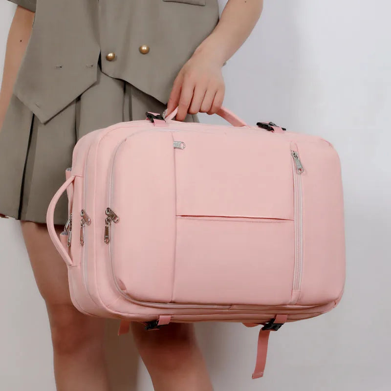 Large waterproof Oxford cloth backpack with multiple pockets, shown in one of five colours, holding a 15.6 inch laptop.