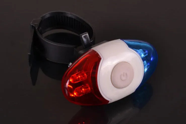 Red and blue LED bicycle tail light with adjustable mounting base