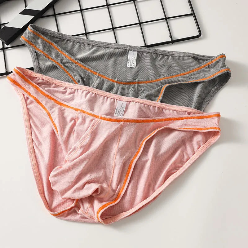 Men's hip-lift underwear in modal ice silk knit showing colour options and Asian sizing