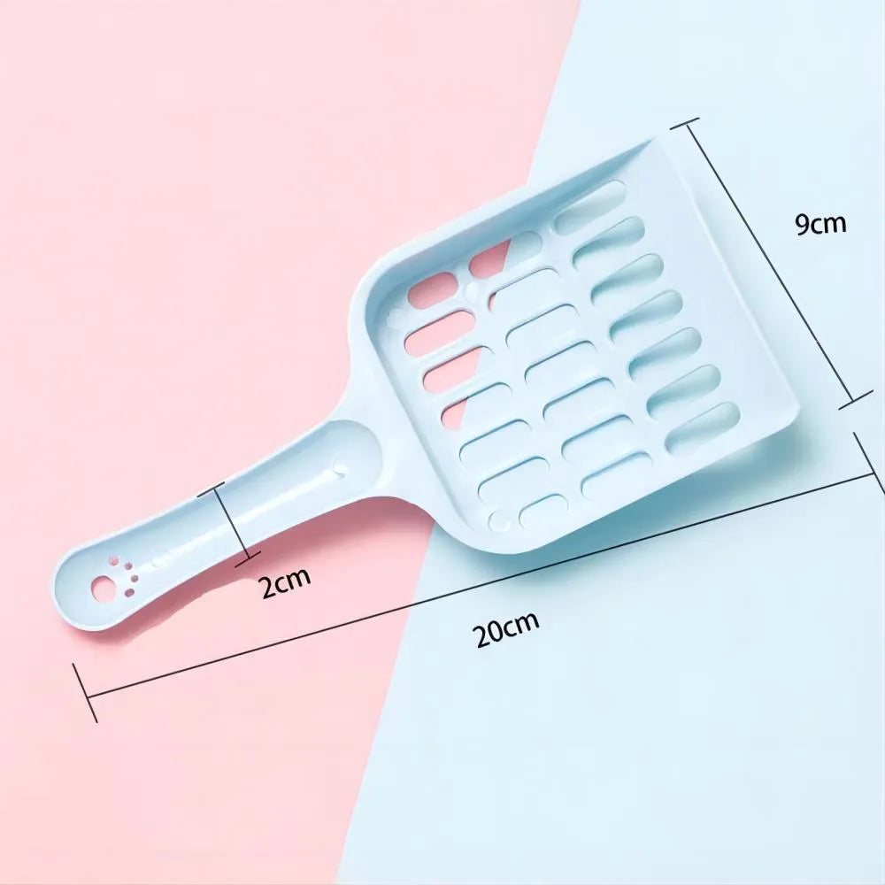 Blue plastic cat litter scoop showing its size on a white background.