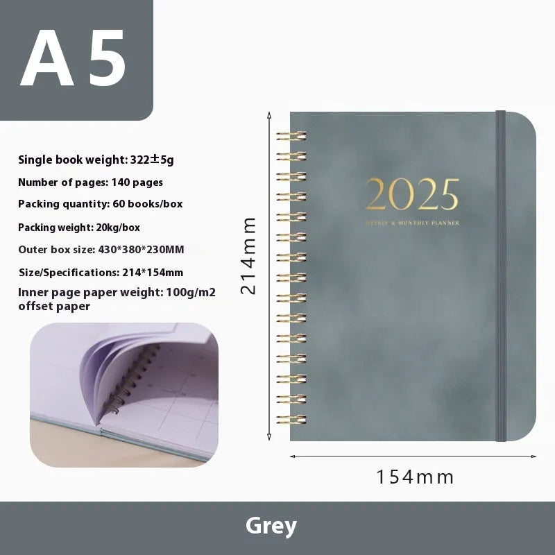 A5 size PU leather notebook with metal coil binding in a choice of colours including black, blue, brown, and pink.