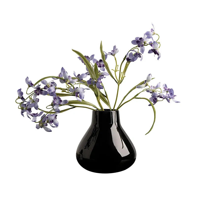Ceramic decorative vase with glass surface in black or white colour with round belly French design