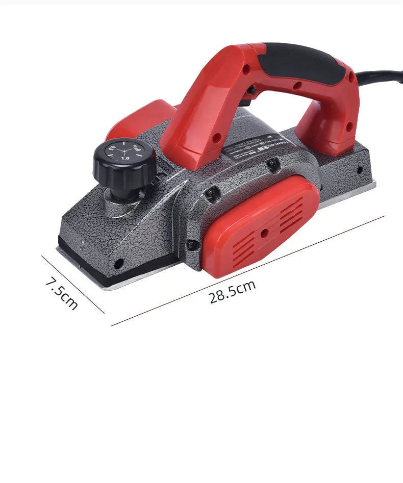 Red electric wood planer tool with aluminum shell showing 82mm planing width measurement