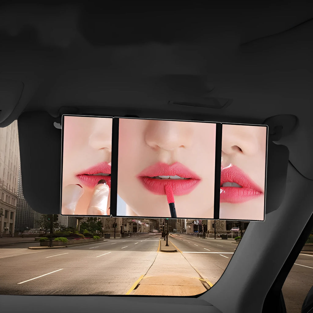 Silver car folding makeup mirror shown both closed at 15.5cm and open at 30.5cm wide.