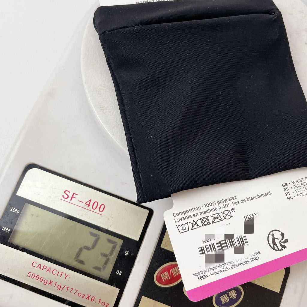 Compact 10x10.5cm wrist bag armband sleeve for mobile phones, shown with cardboard packaging for camping and fitness use.