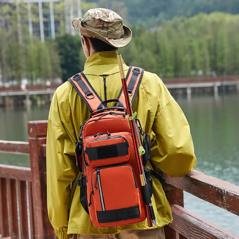 Large orange and black outdoor backpack with 20-35 litre capacity for hiking camping cycling