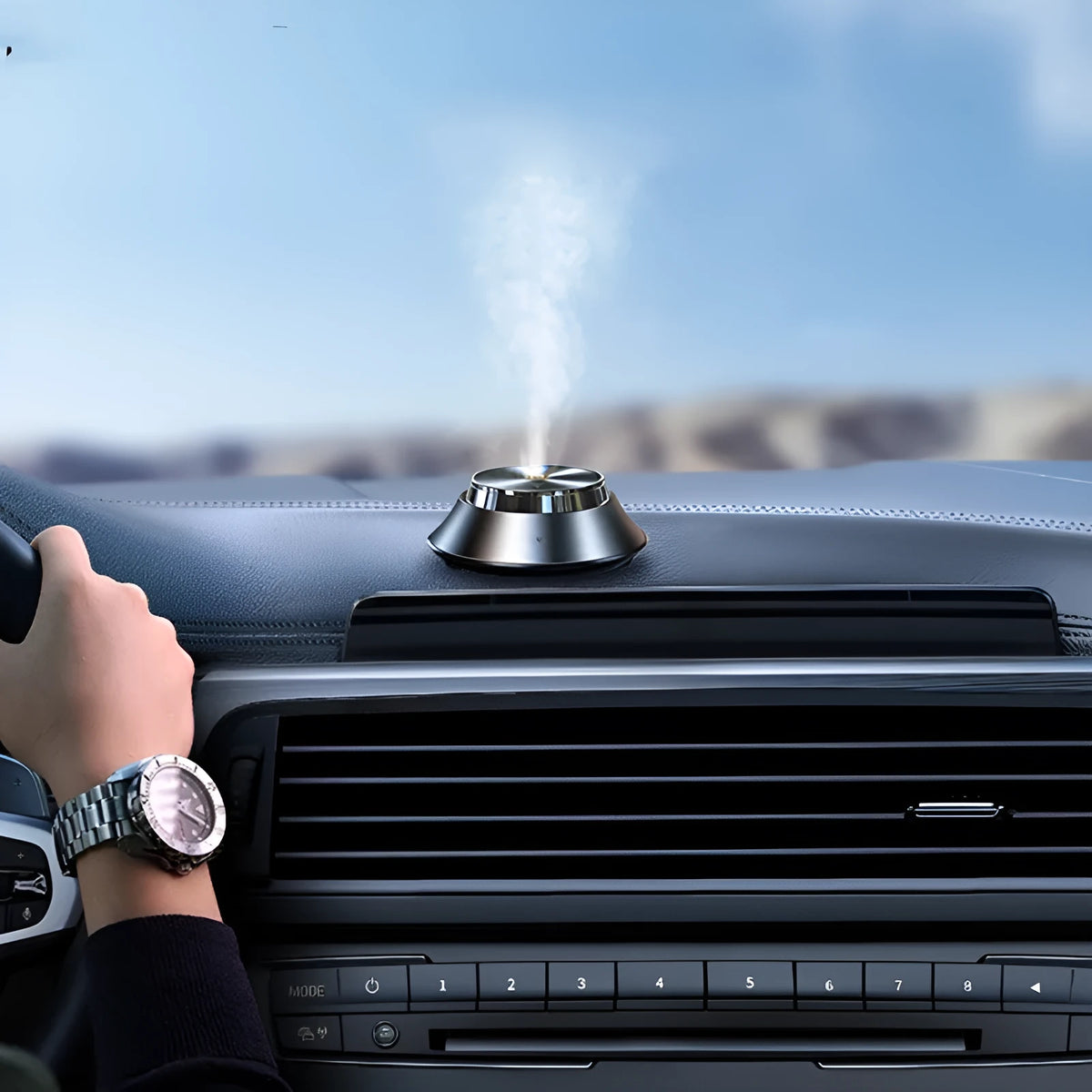 Black metal butterfly design car aromatherapy air purifier with USB cable and essential oil bottle.