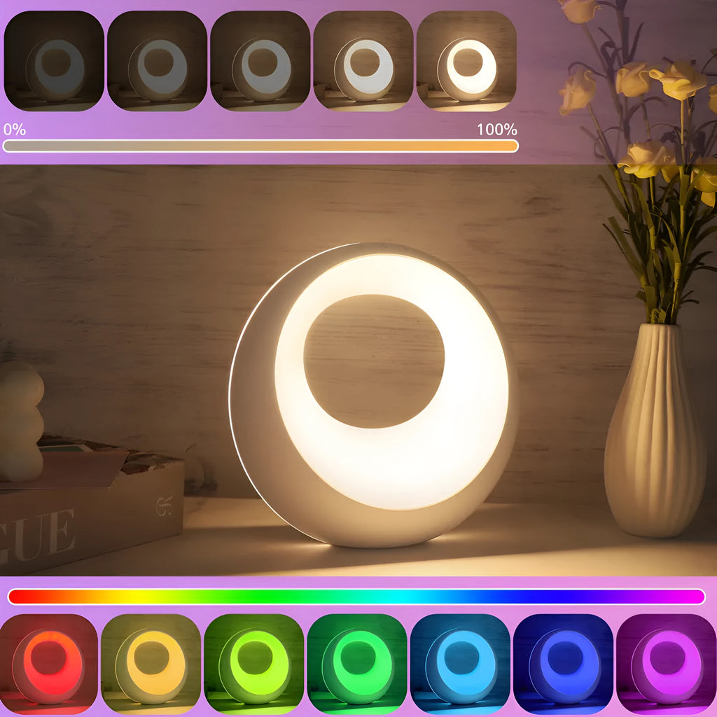 Creative Touch small RGB colour changing desk lamp with remote control on wooden surface