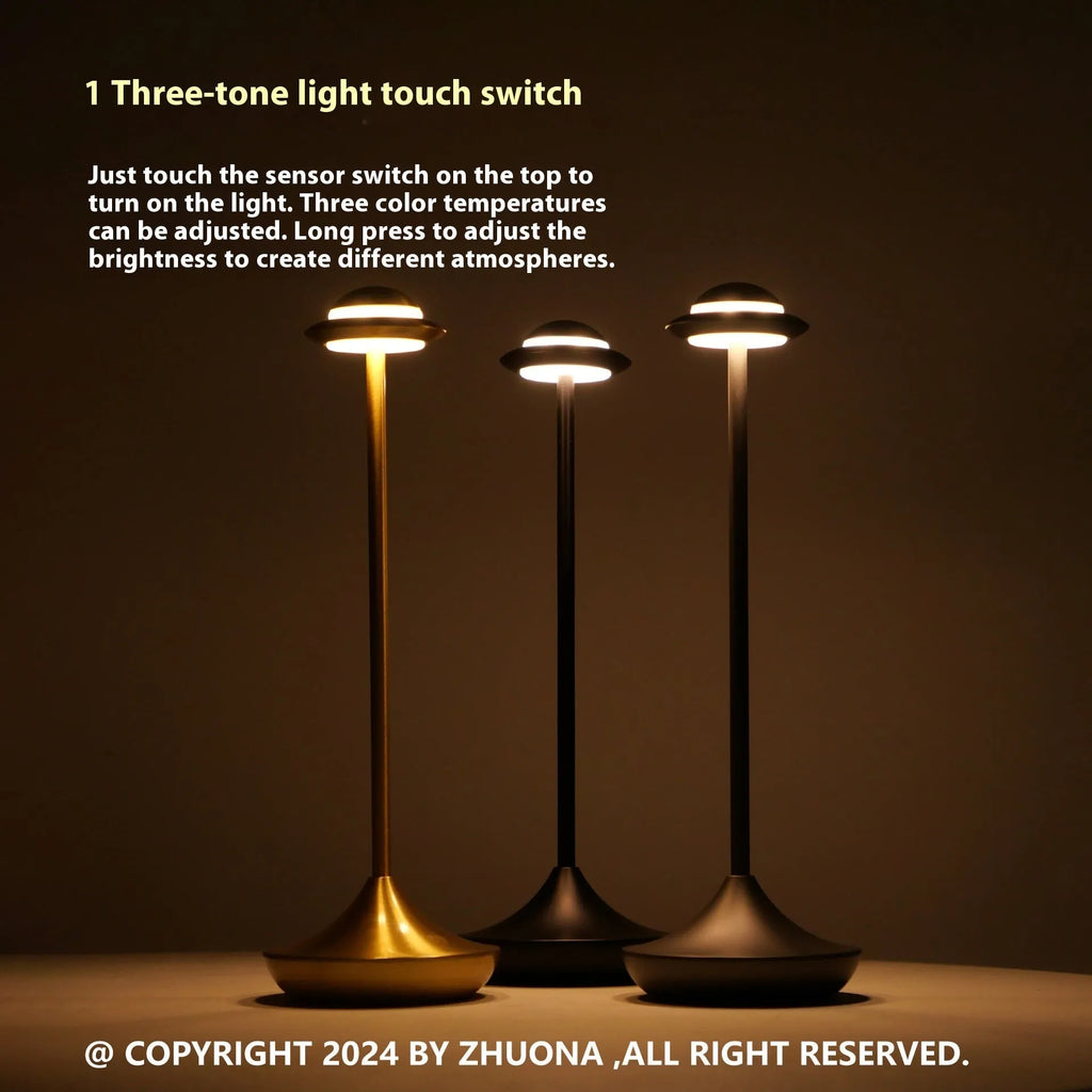 UFO-shaped metal table lamp with touch controls in black, gold or grey colour options