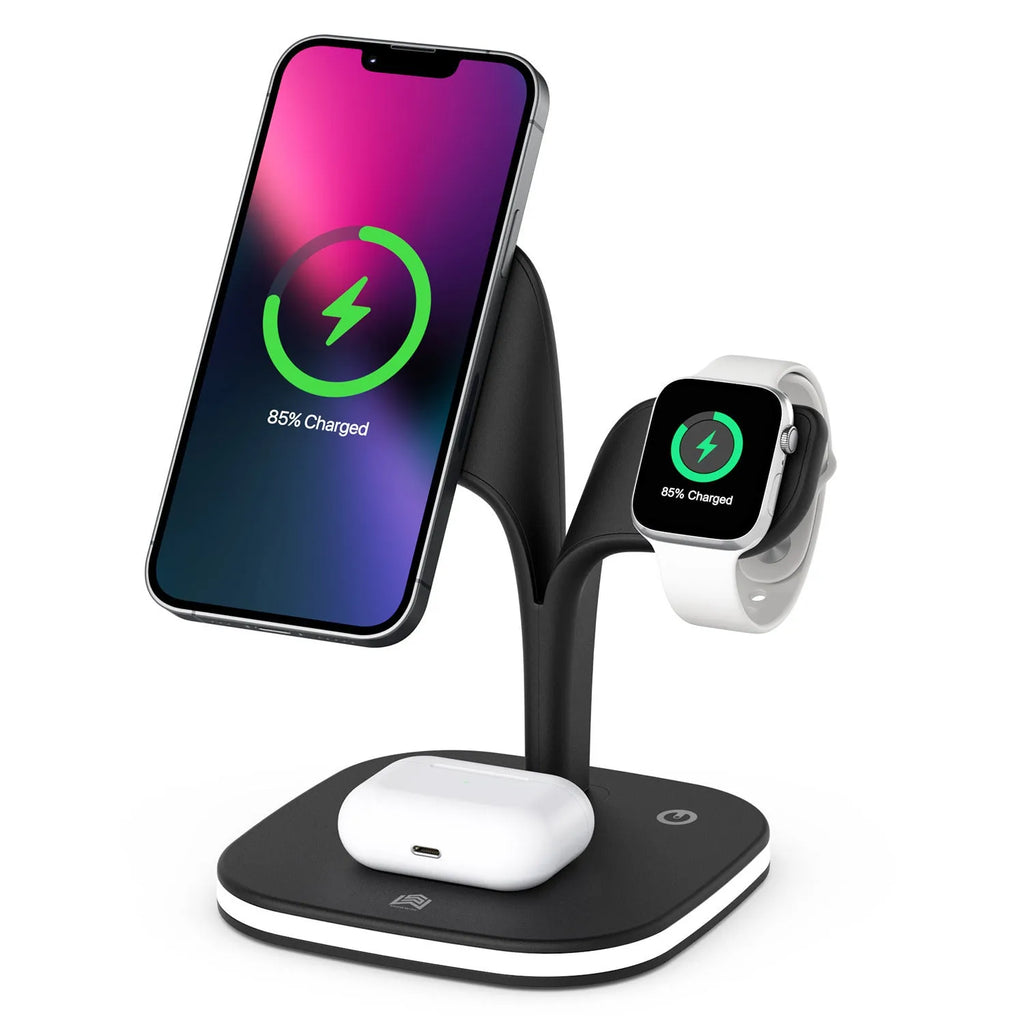 Black and white wireless charging stand for phone, watch, and headphones on a desk.