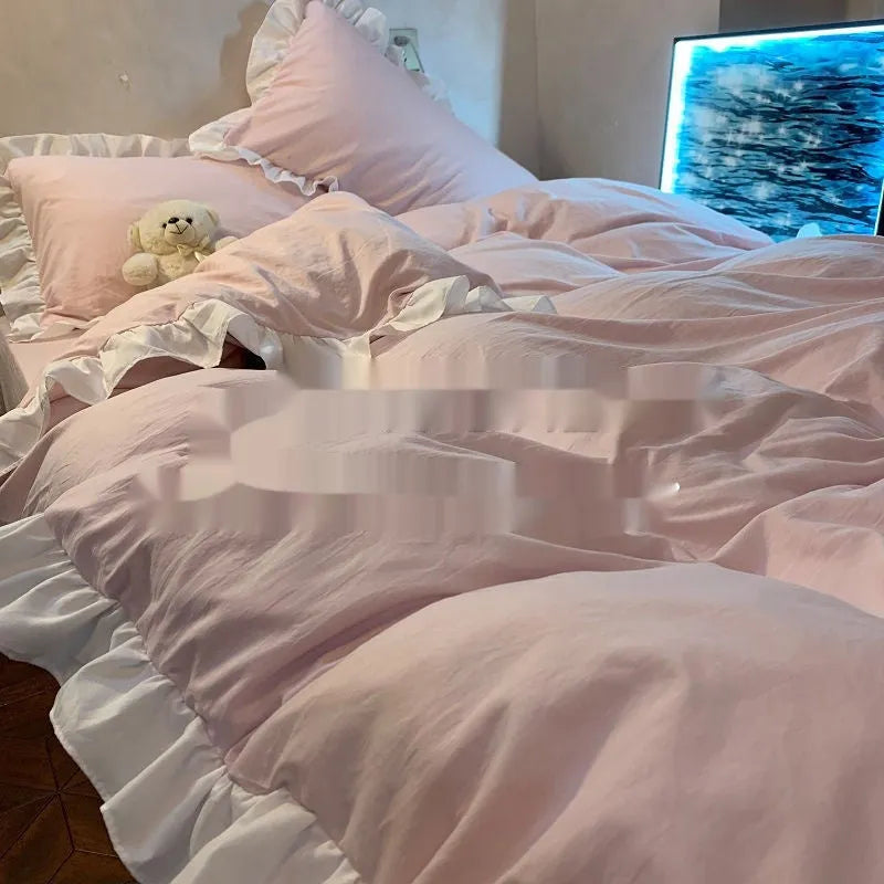 Mori style solid colour washed cotton bedding four-piece set with quilt cover on a bed.