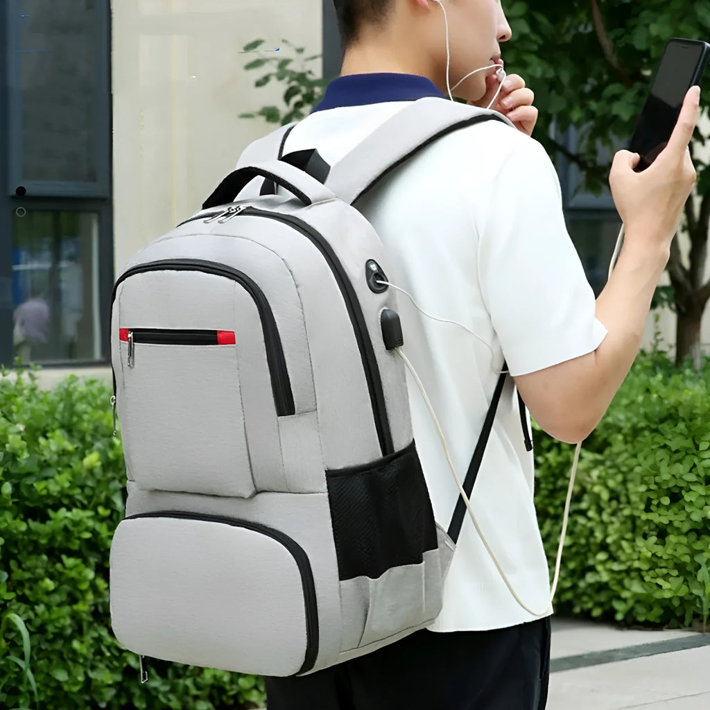 Insulated Oxford cloth backpack in grey with curved shoulder straps and multiple compartments