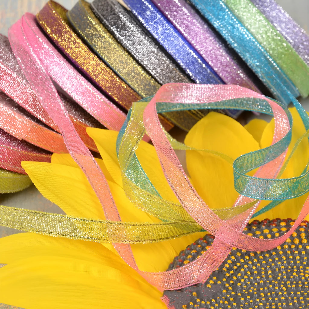 Green onion colour polyester ribbon with gold silk detailing measuring 1cm wide
