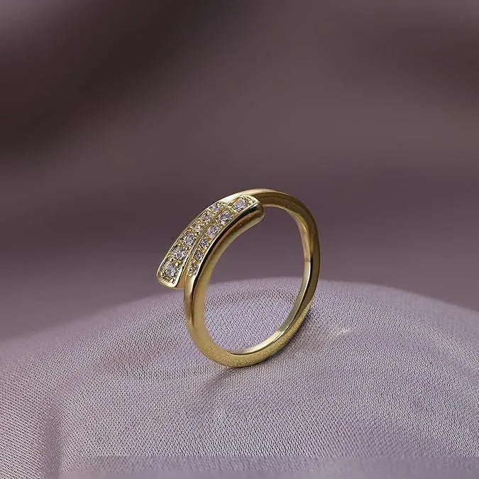 Geometric toe ring with copper plating and 14K gold finish, showing rhinestone decoration