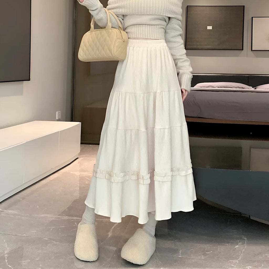 Women's corduroy A-line midi skirt with elastic waistband in beige, black or brown colours