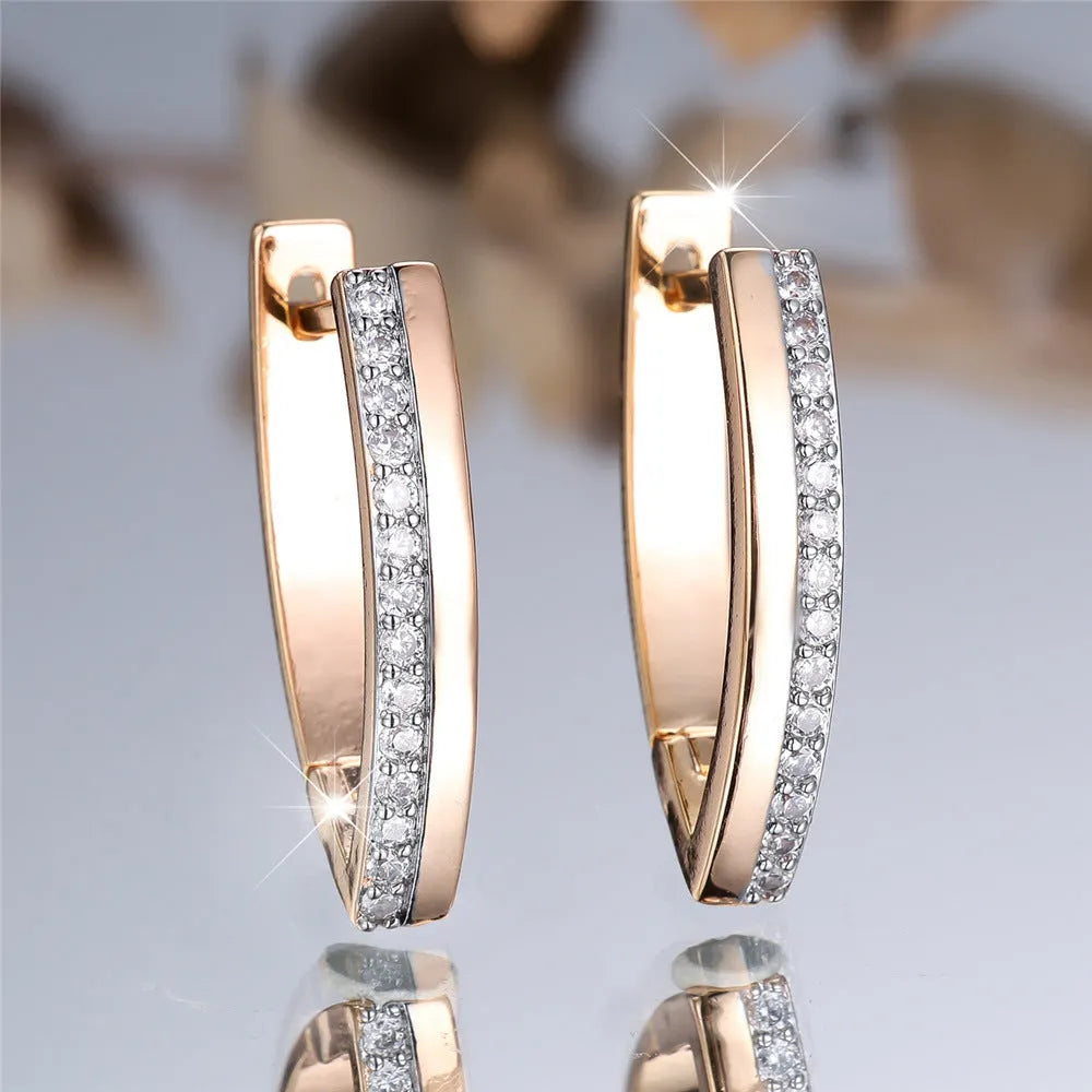 Women's geometric V-shaped ear clips with champagne gold electroplating and white diamond accents