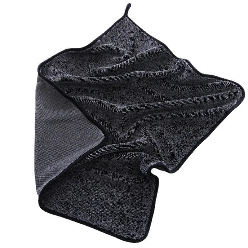Grey car cleaning towel with black trim edge in various sizes from 20x30cm to 60x160cm.