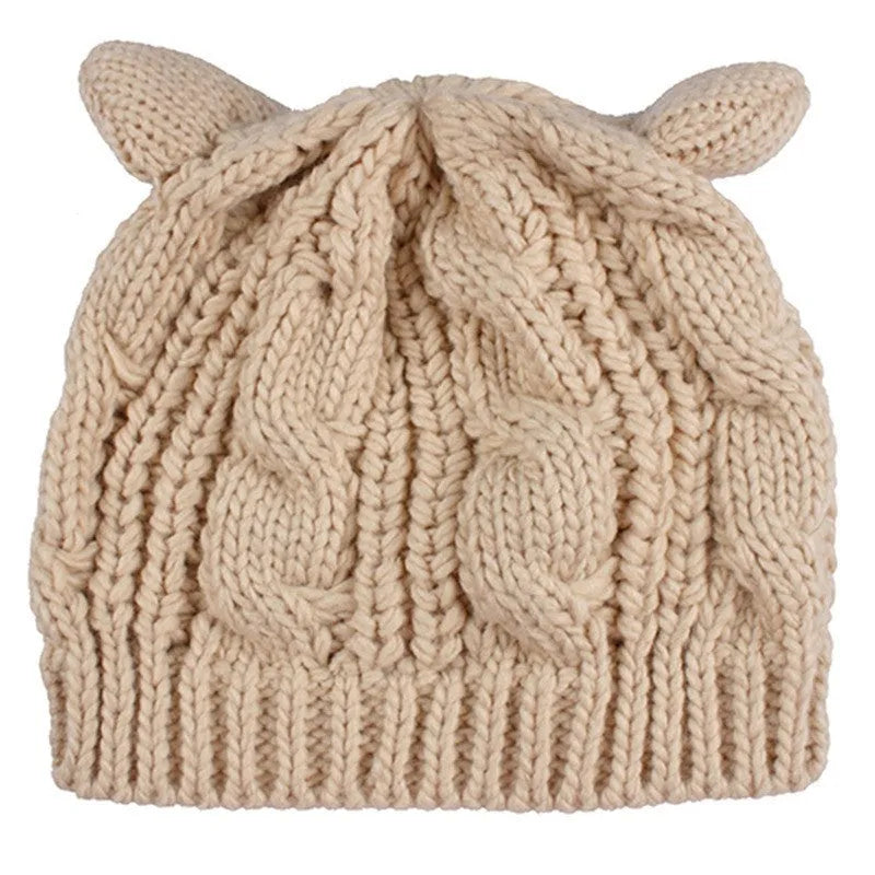 Hand-knitted cat ear winter beanie in red wool with 3D design