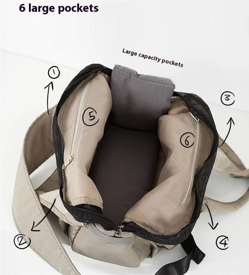 Apricot coloured cloth pet handbag with breathable mesh, shown with dimensions 41cm by 16cm by 28cm
