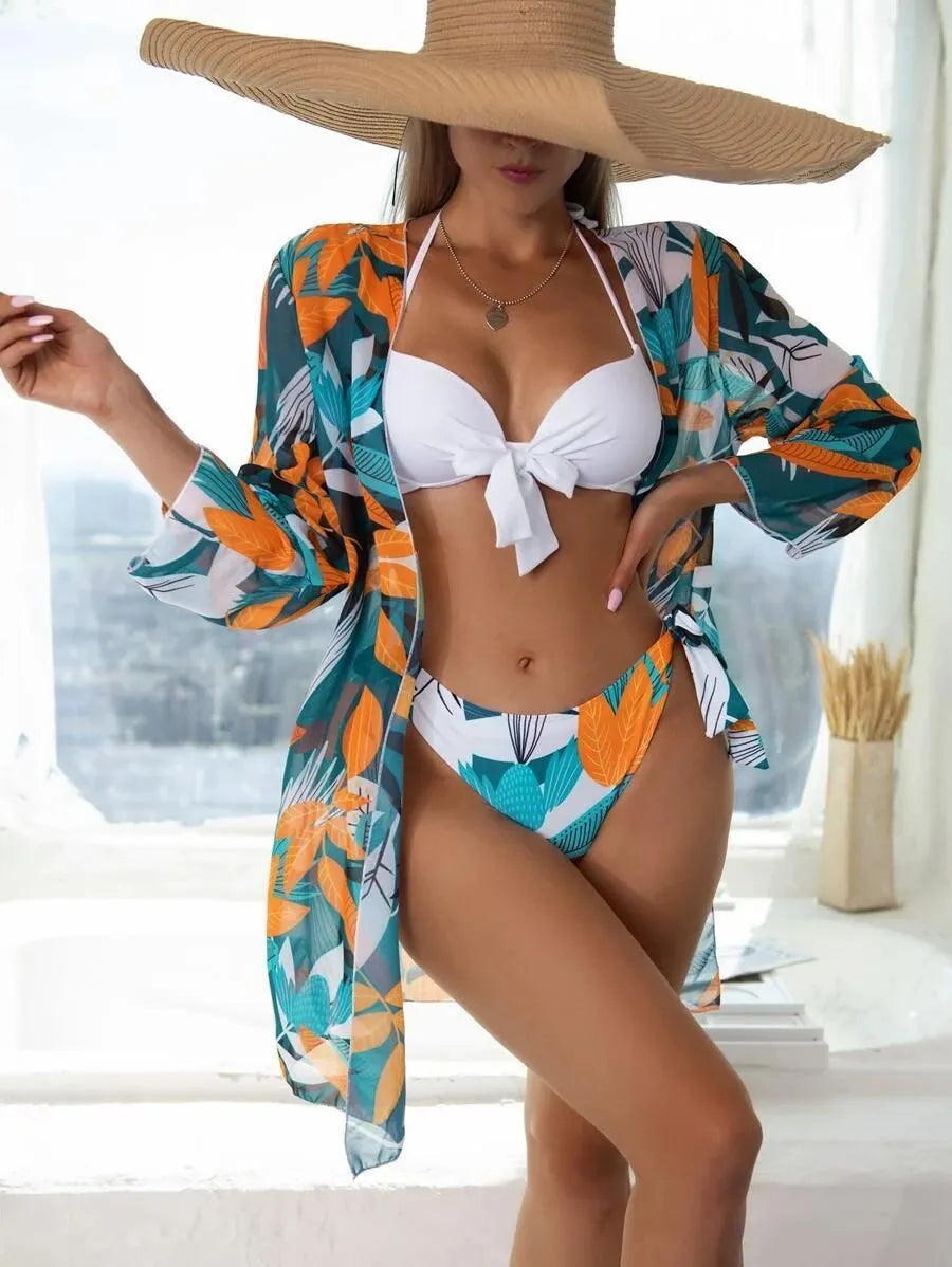Women's three-piece mesh bikini swimsuit set in a fresh, conservative style with a coordinating coat.