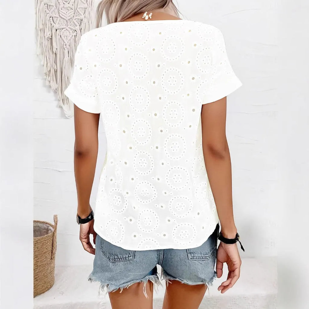 White women's V-neck t-shirt with hollow out detailing and regular short sleeves