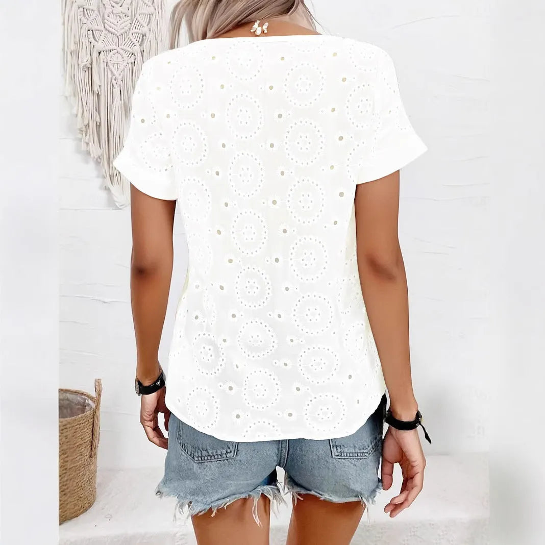 White women's V-neck t-shirt with hollow out detailing and regular short sleeves