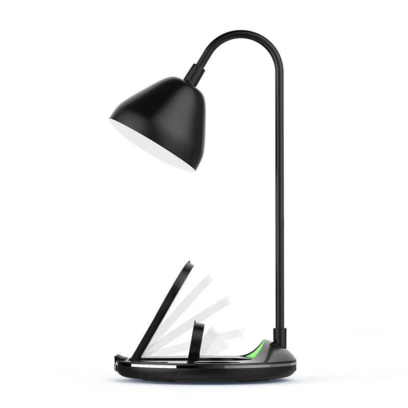 Black folding wireless charger showing magnetic phone attachment and built-in cable storage compartment