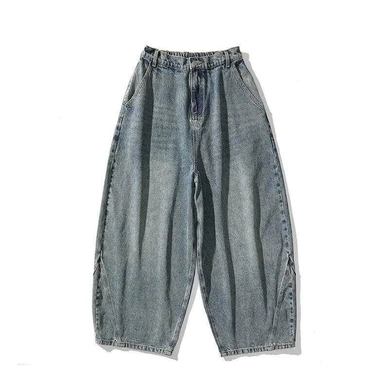 Men's plus size wide leg jeans in dark blue denim with a baggy fit and straight leg opening.