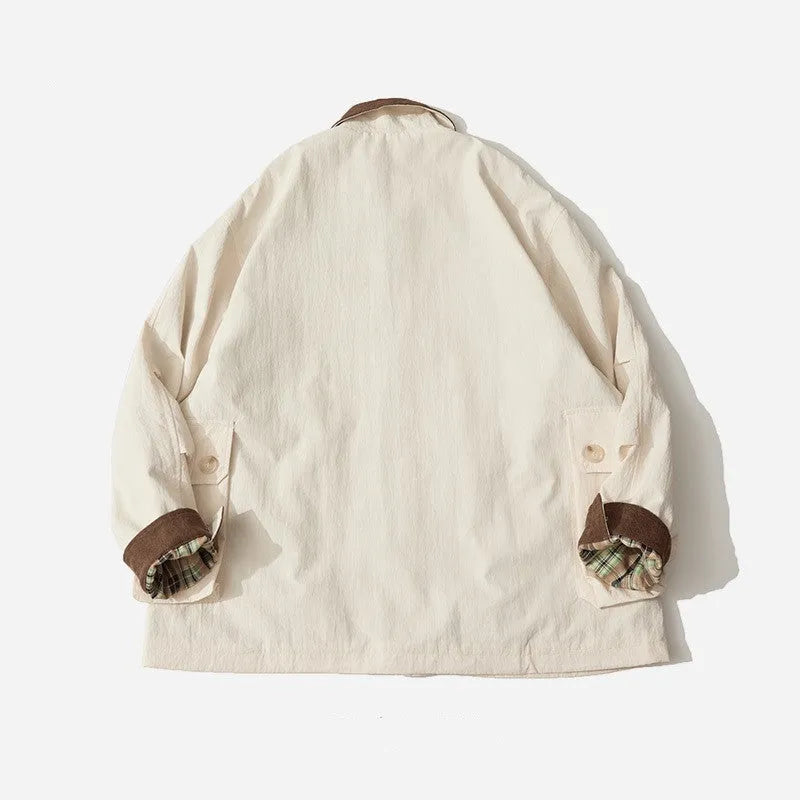 Men's and women's apricot and green polyester casual jacket with contrast panels and side pockets.
