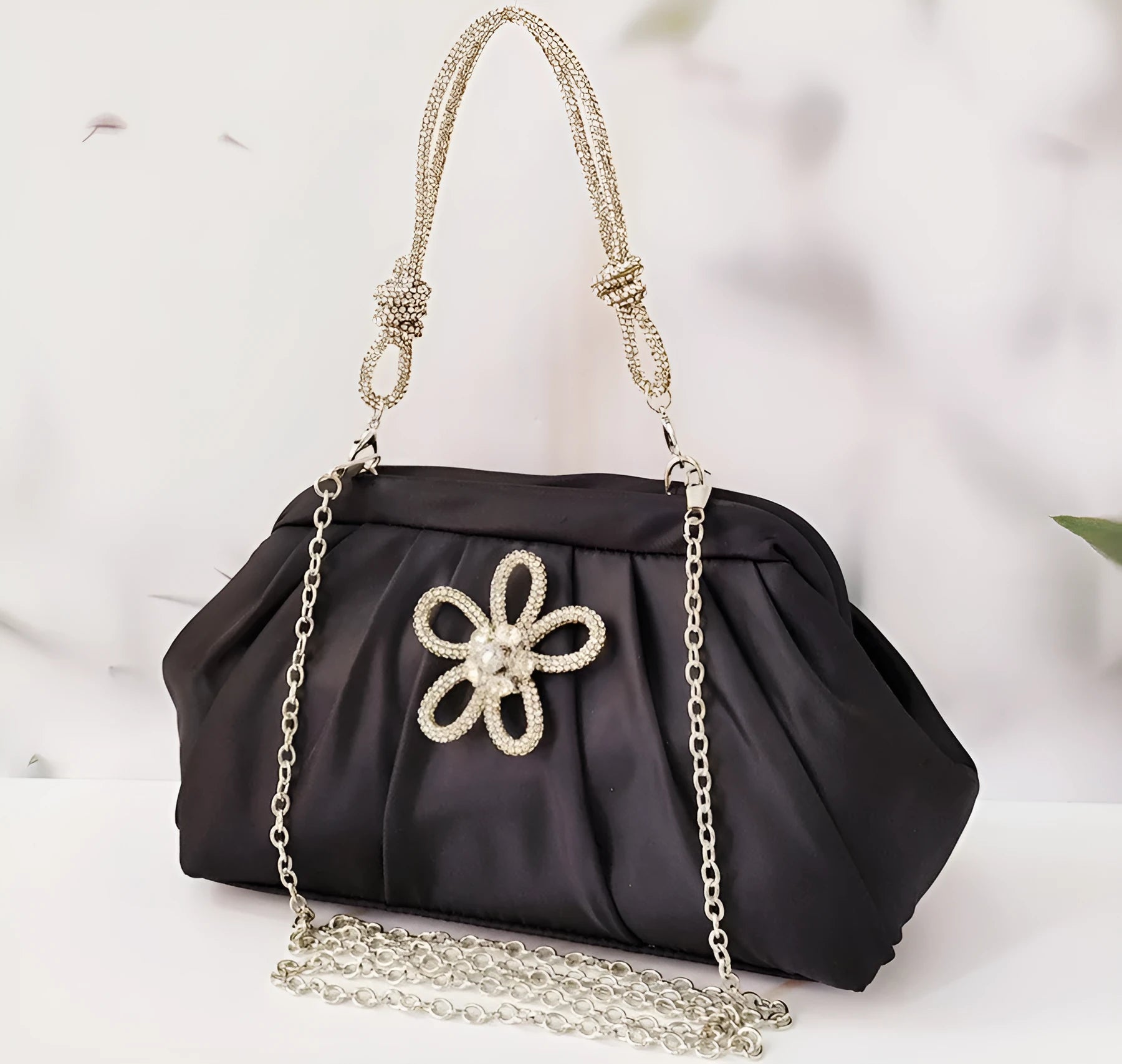 Women's soft polyester dinner bag with chain detailing, document compartment, and shell-shaped design in three colour options