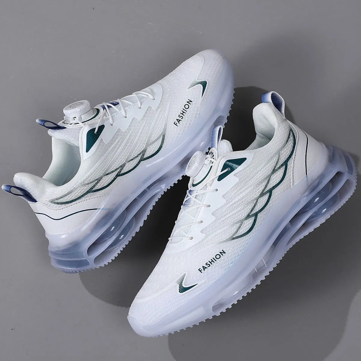 White youth sports casual shoes with rotating button and lace-up closure, mesh upper, and rubber sole.