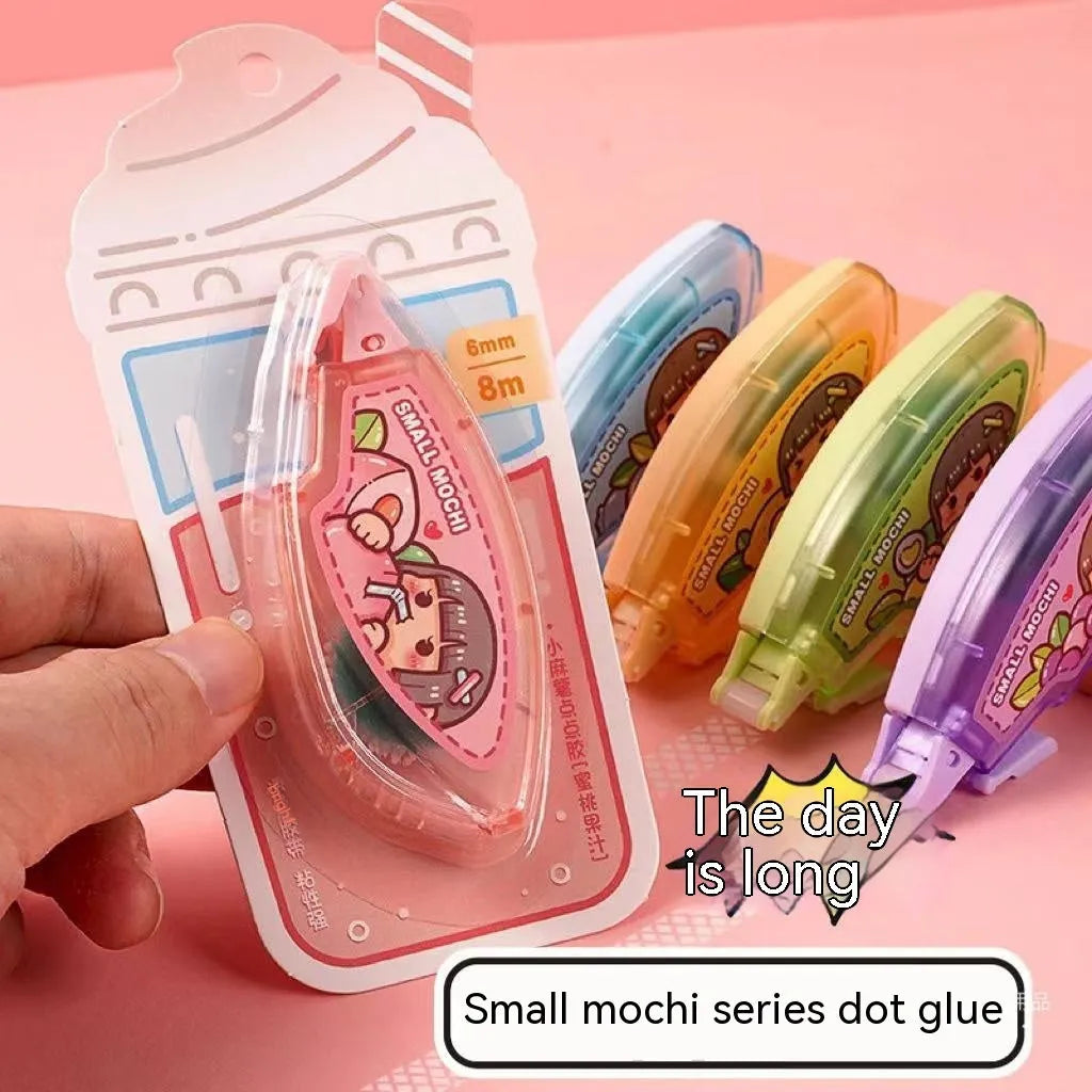 Dotting glue in peach juice colour with cute styling and card packaging