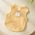 Hollowed-out cat clothes with bear patch in knitted fabric, shown in green colour