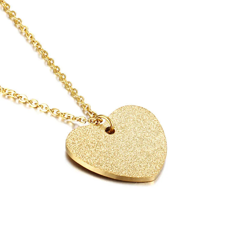 Geometric heart-shaped titanium steel pendant necklace on model, simple fashion style