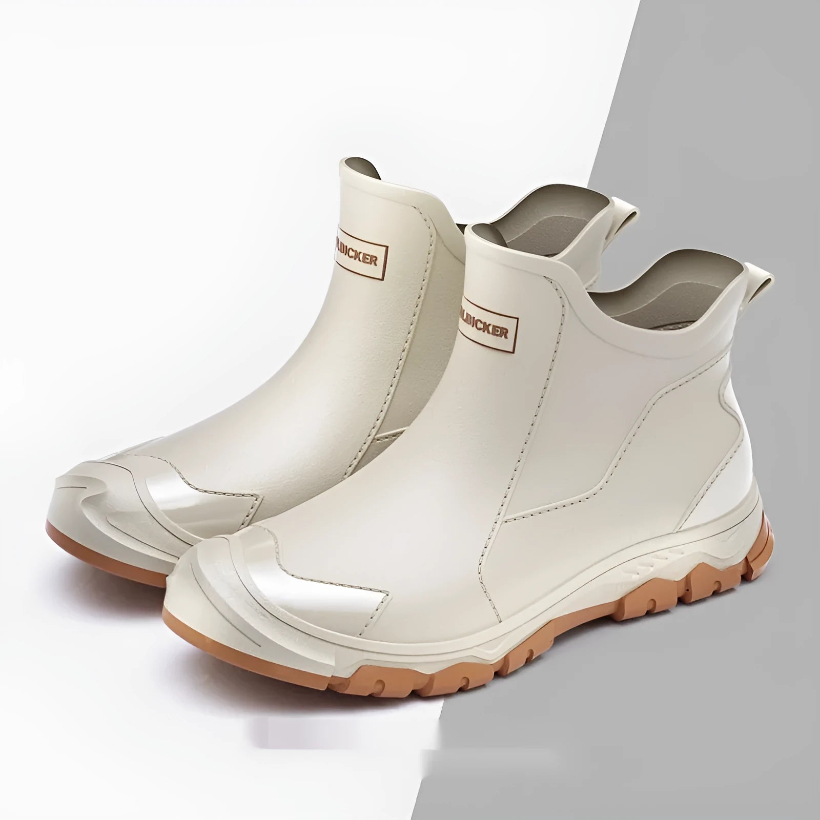 Short tube PVC wading shoe with round toe and non-slip plastic sole on a wet surface.