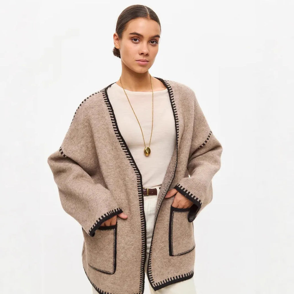Loose mid-length knitted cardigan in imitation cashmere cotton fabric shown in black colour