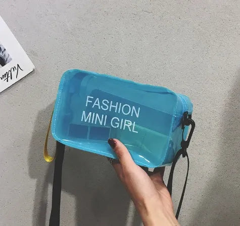 Transparent square jelly shoulder bag with adjustable strap in various colours on a white background.
