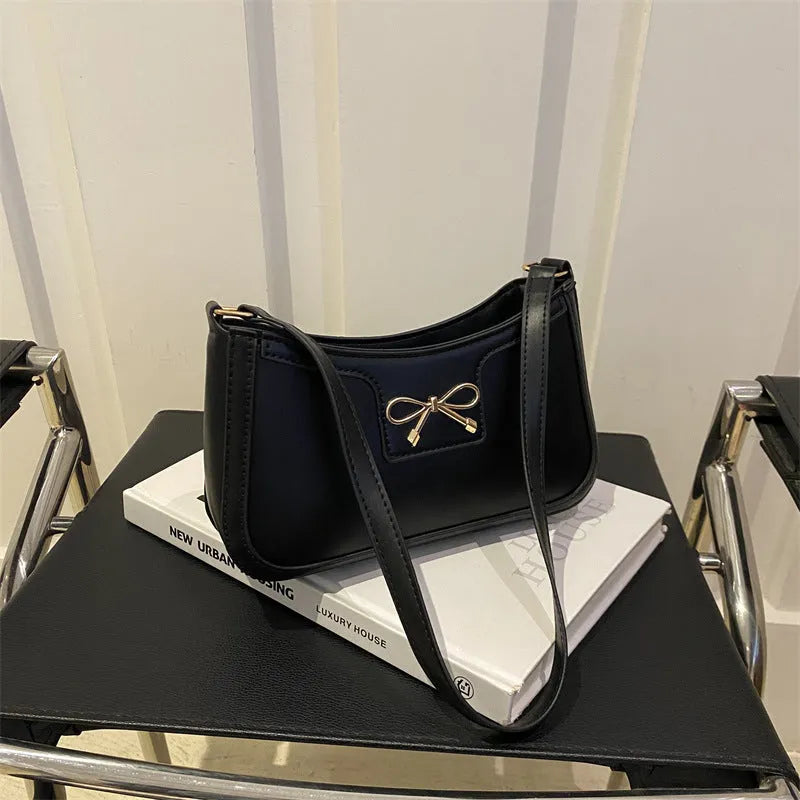 Western style baguette shoulder bag in horizontal square shape with bow decoration, shown in available colours