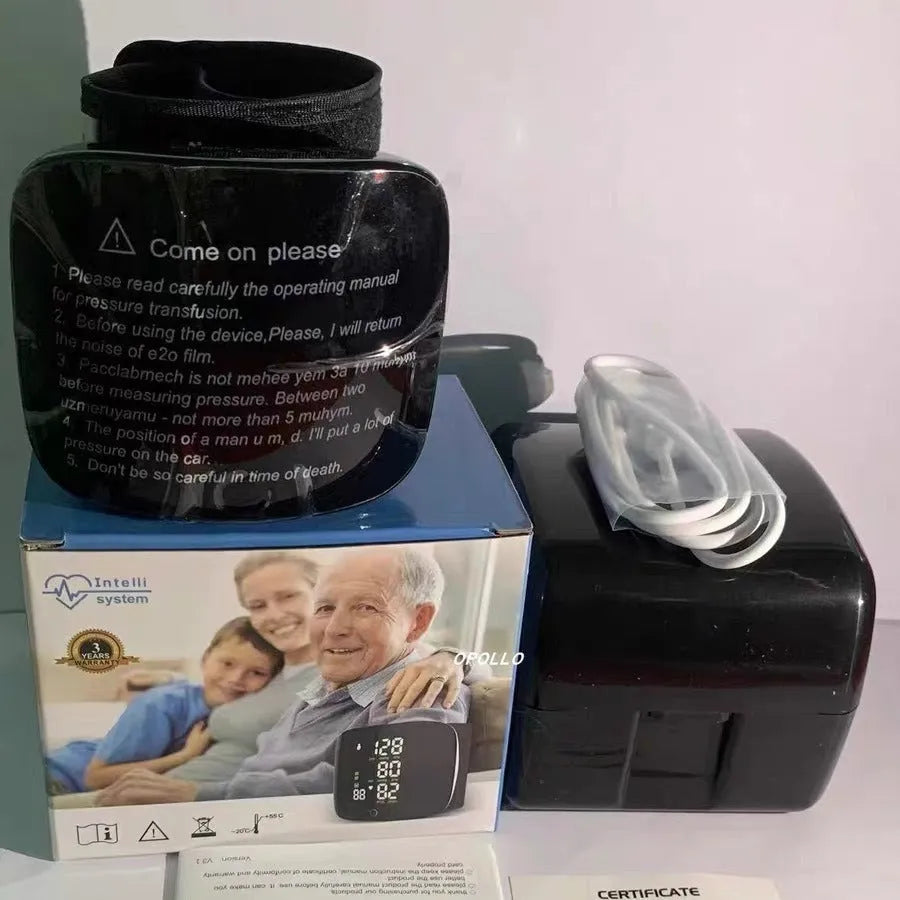Black wrist blood pressure monitor with digital display and USB charging port