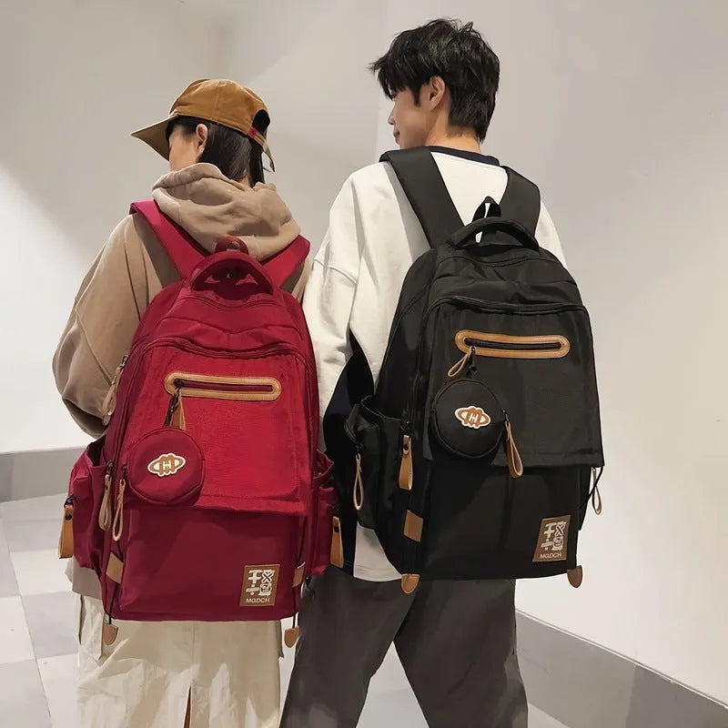 Large-capacity nylon backpack for middle school students with curved shoulder straps in street trend style