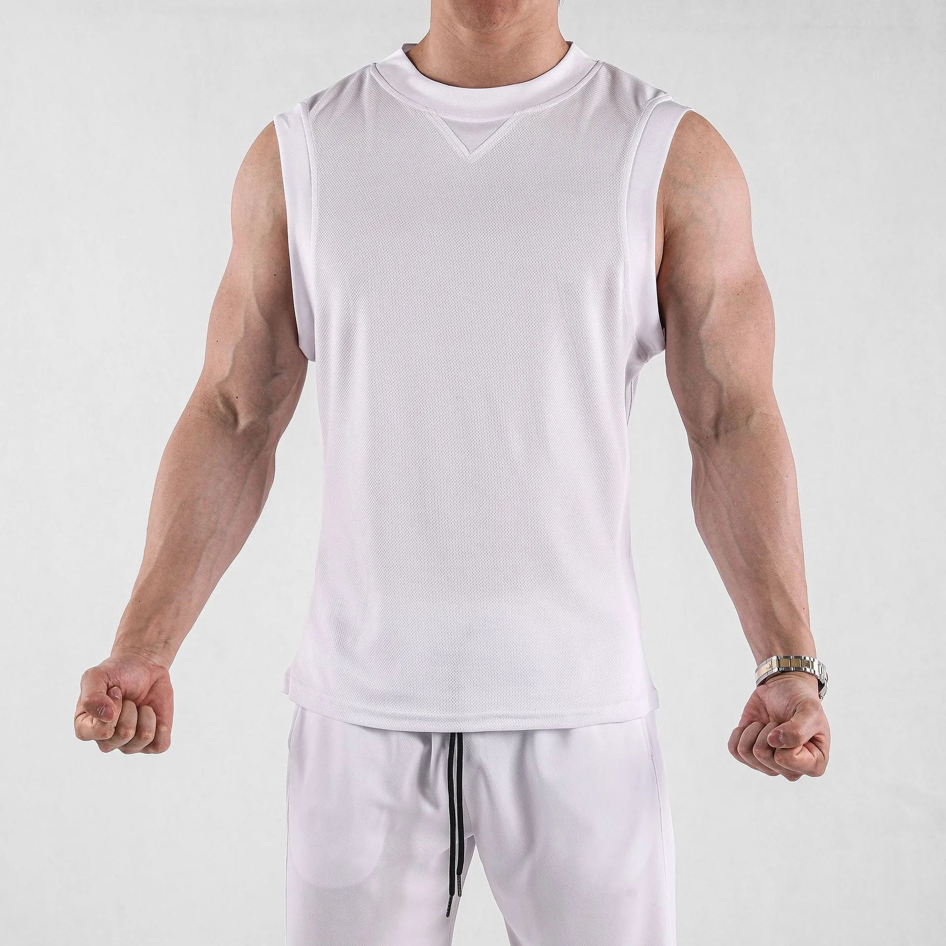 Men's loose black quick-dry sport vest on a hanger