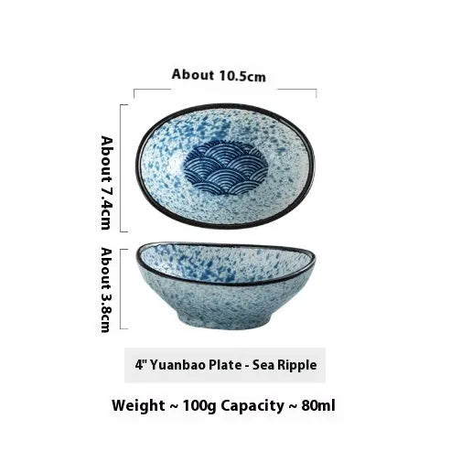 Japanese oval ceramic sauce dipping bowl with traditional underglaze pattern design