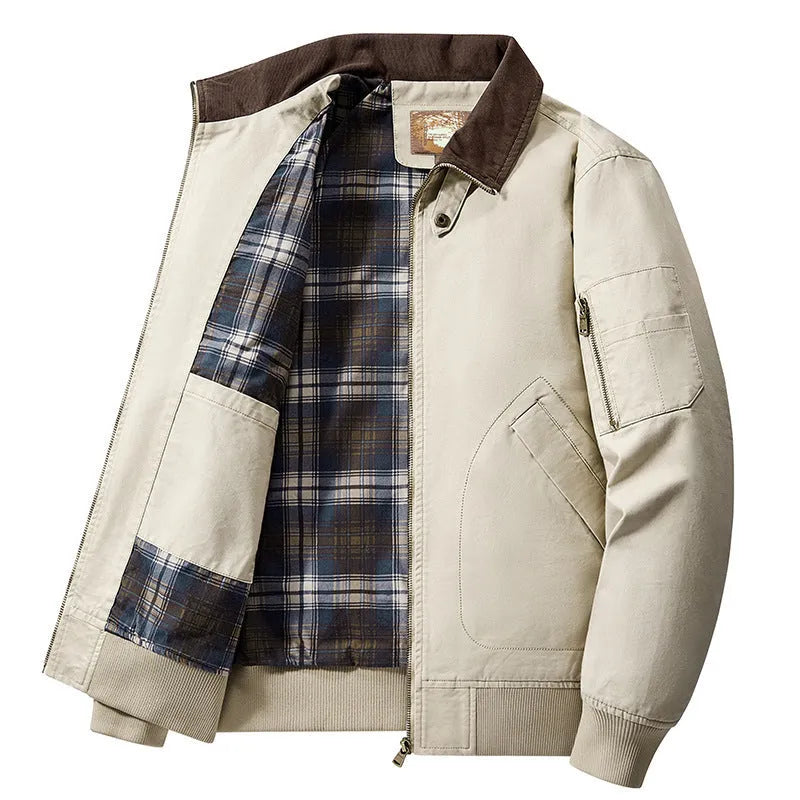 Men's washed cotton baseball-style flight jacket in beige, shown in a casual setting.