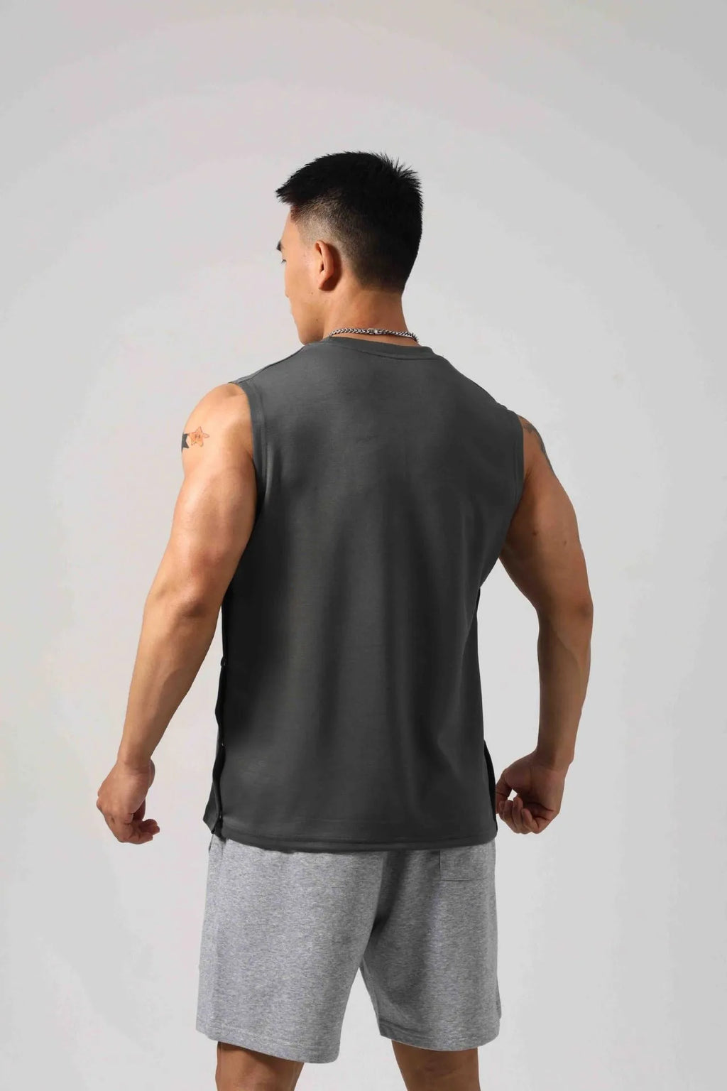 Korean style loose cotton fitness vest for men with hidden hook side opening in black colour