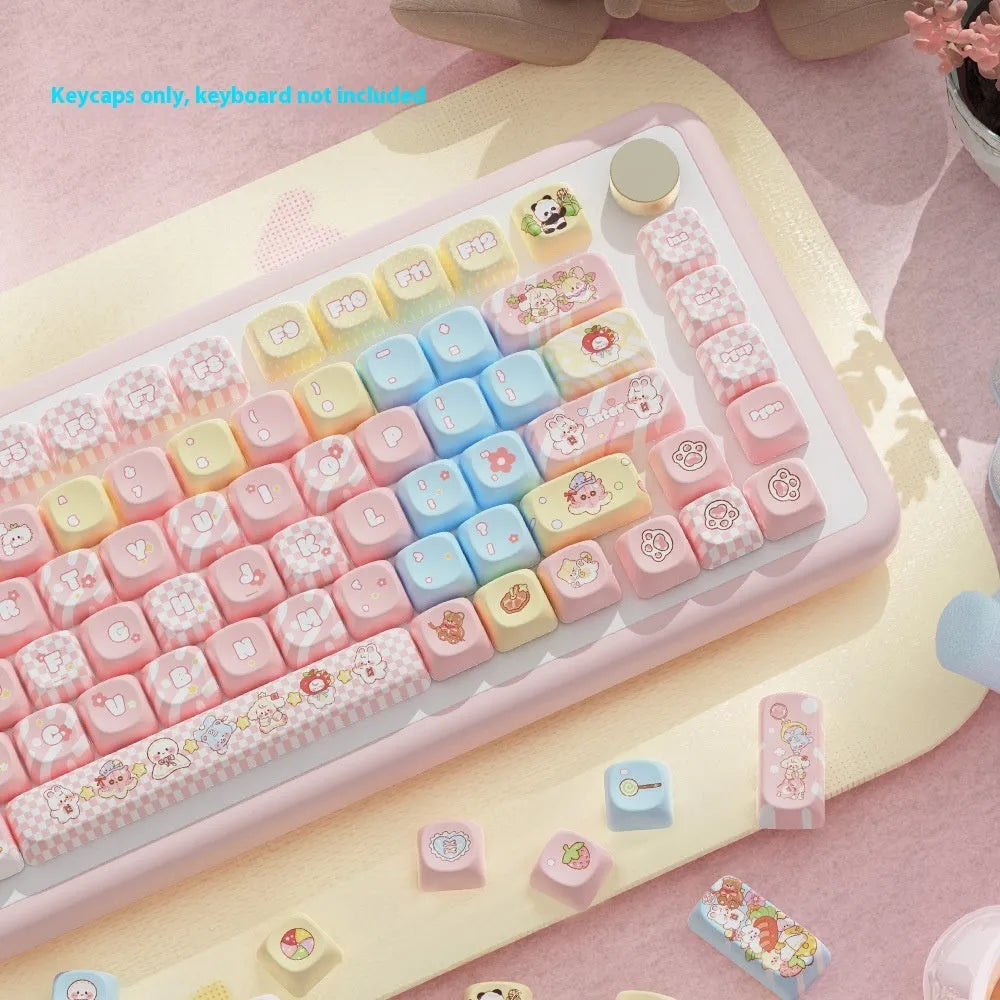 Clip doll themed mechanical keyboard keycaps with colourful doll artwork on key surfaces