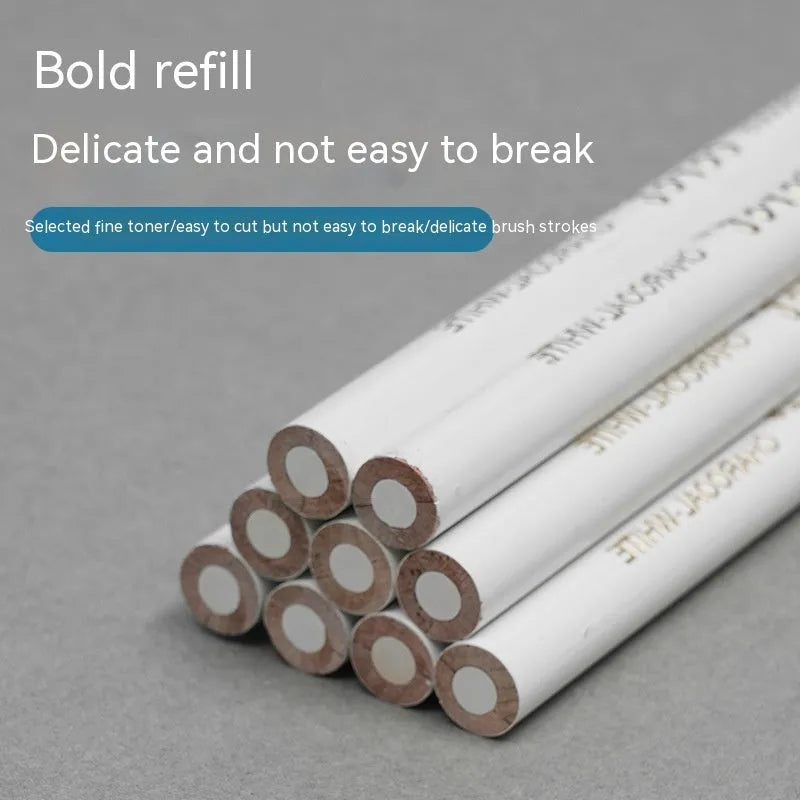 Set of three white charcoal pencils with wooden shells for highlighting and shading art on dark paper