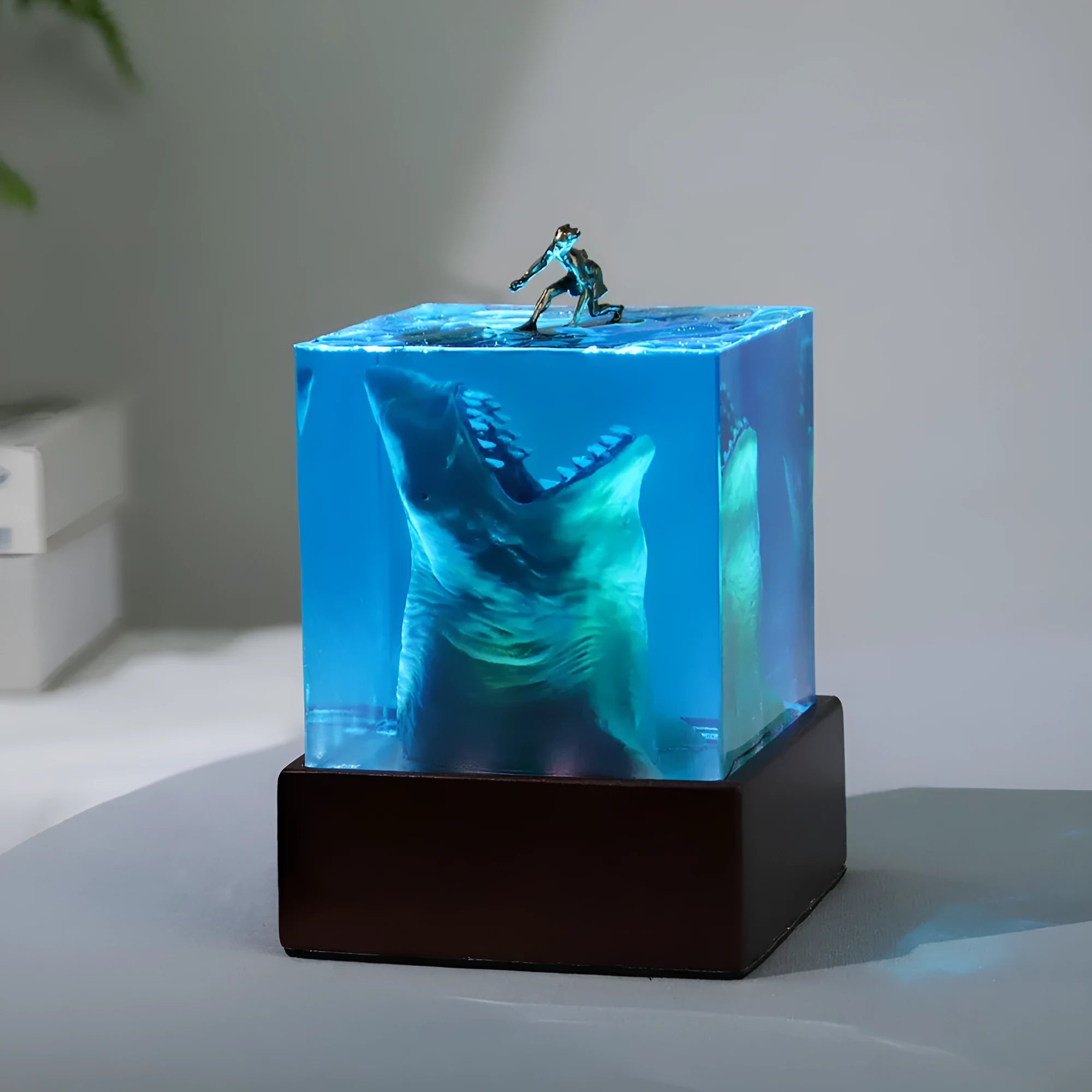 Surfing shark micro landscape resin night light ornament on wooden surface